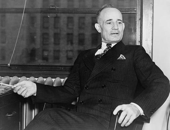 A picture of Napoleon Hill sitting.