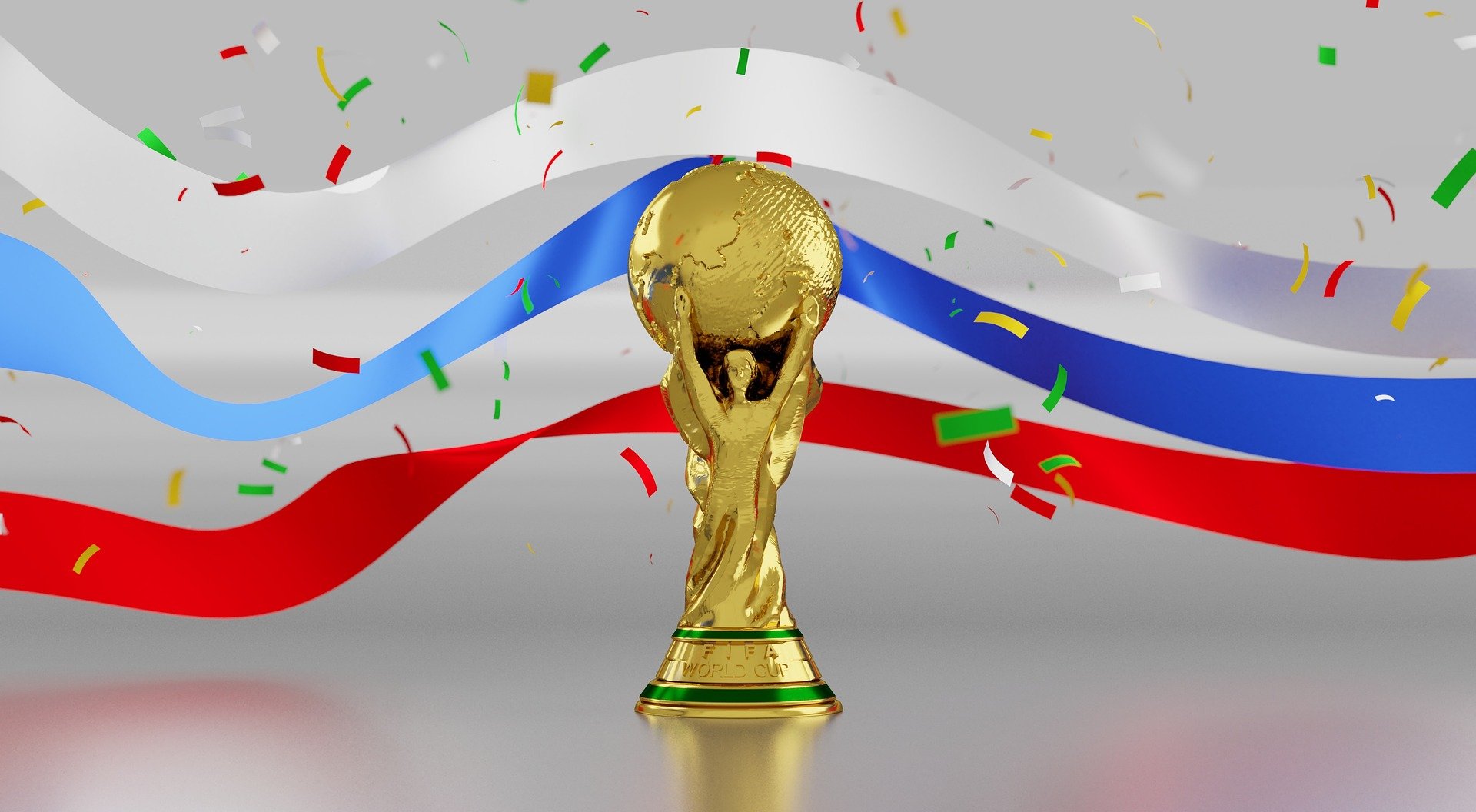 the soccer world cup with white, blue and red ribbons plus confetti