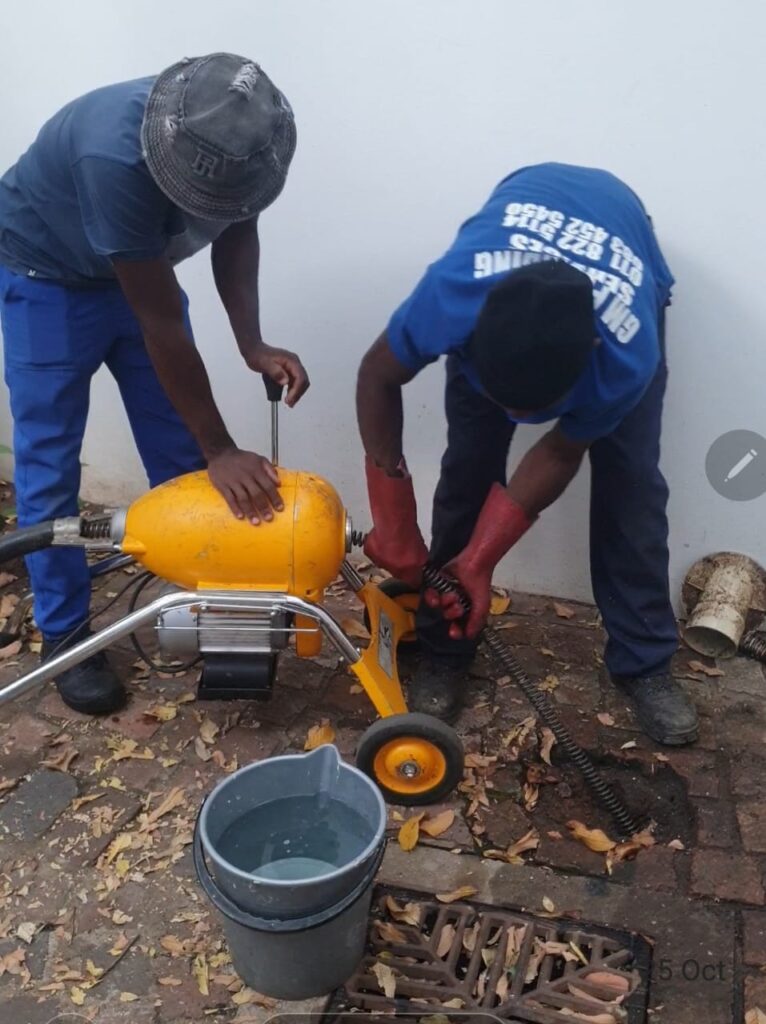 GM Plumbing workers in action